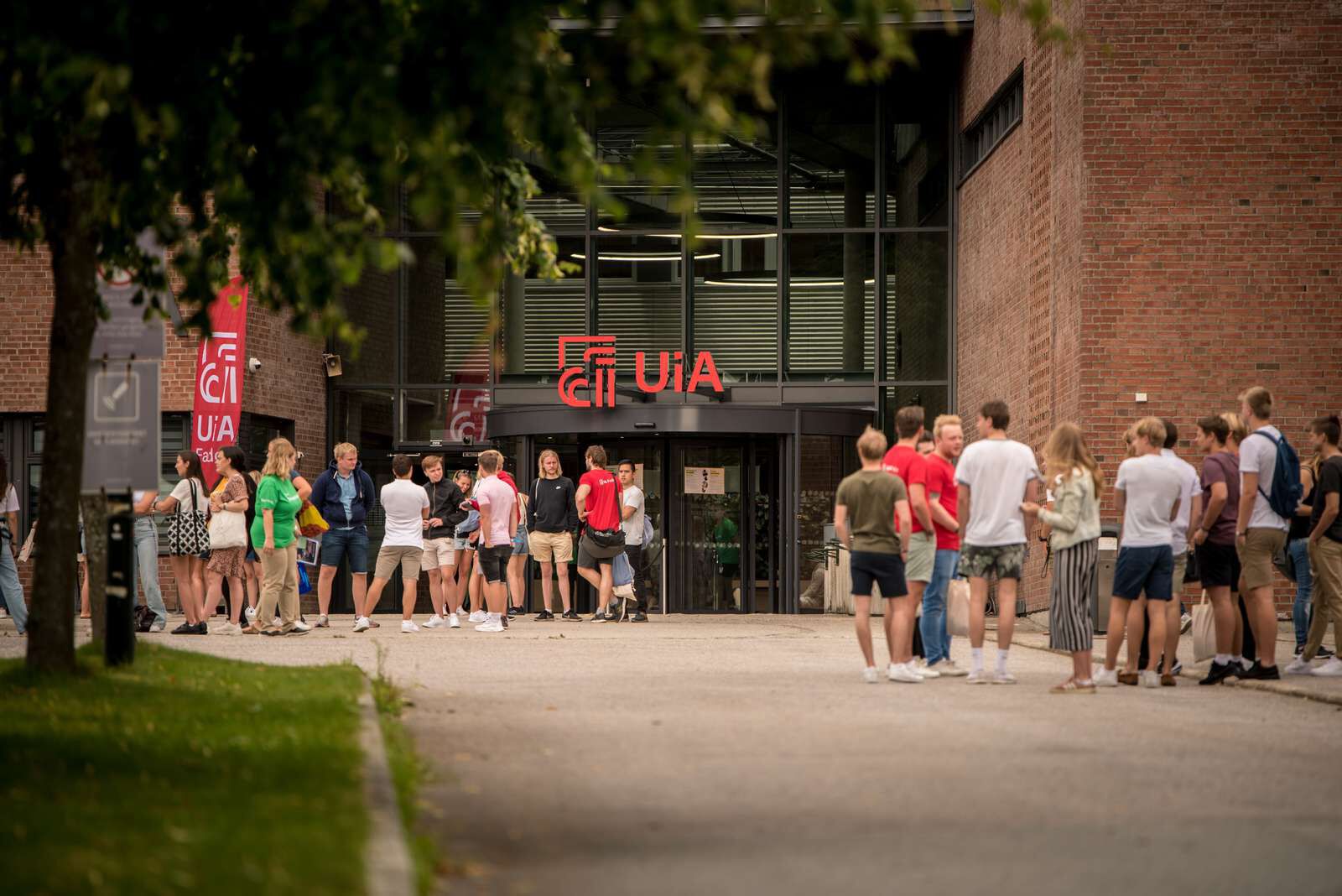 Students gathering outside of the University of Agder Campus in Kriistiansand