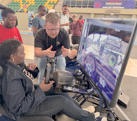 Master’s student in Multimedia and Game Technologies, Bjørnar Helle Mjølsnes, introduces a racing game to Rwanda’s ambassador to the Nordic countries, Dr. Diane Gashumba (Photo: Ghislain Maurice).