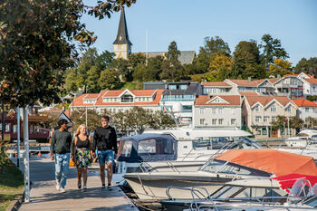 Sky ,Boat ,Watercraft ,Building ,Vehicle.