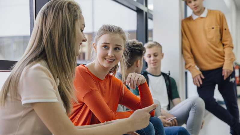 Photo of youth in conversation