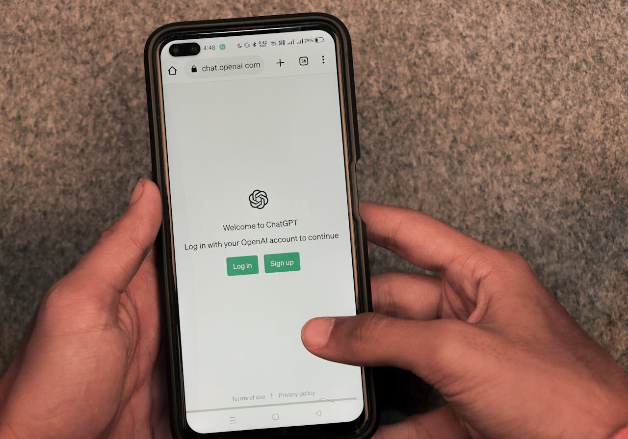 The image shows a mobile phone using the app ChatGPT.