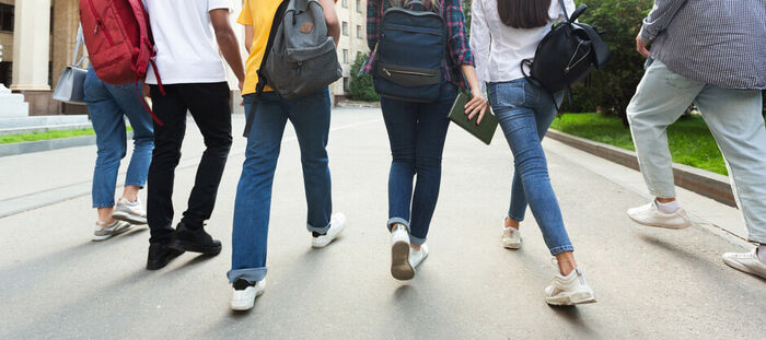 Photo shows a group of young people.