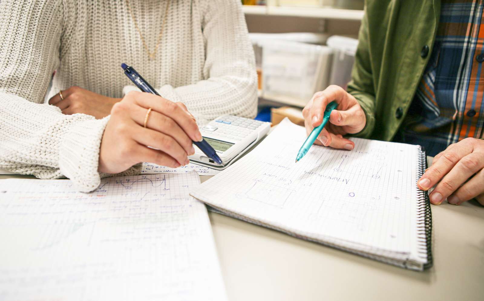 Illustratration photo shows students cooperating on maths exercises