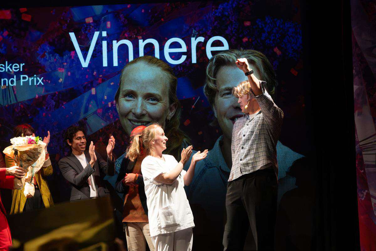 Photo of the winners on stage