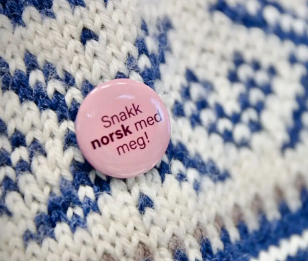 Button with text: "Snakk norsk med meg"