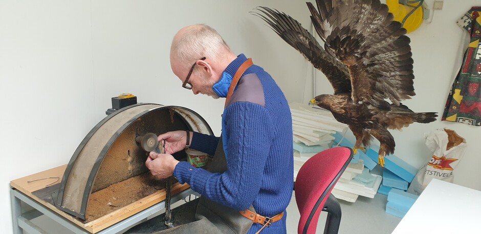man working on viper skin