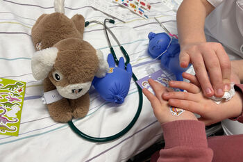 Image may contain: Stuffed toy, Toy, Teddy bear, Wrist, Plush.