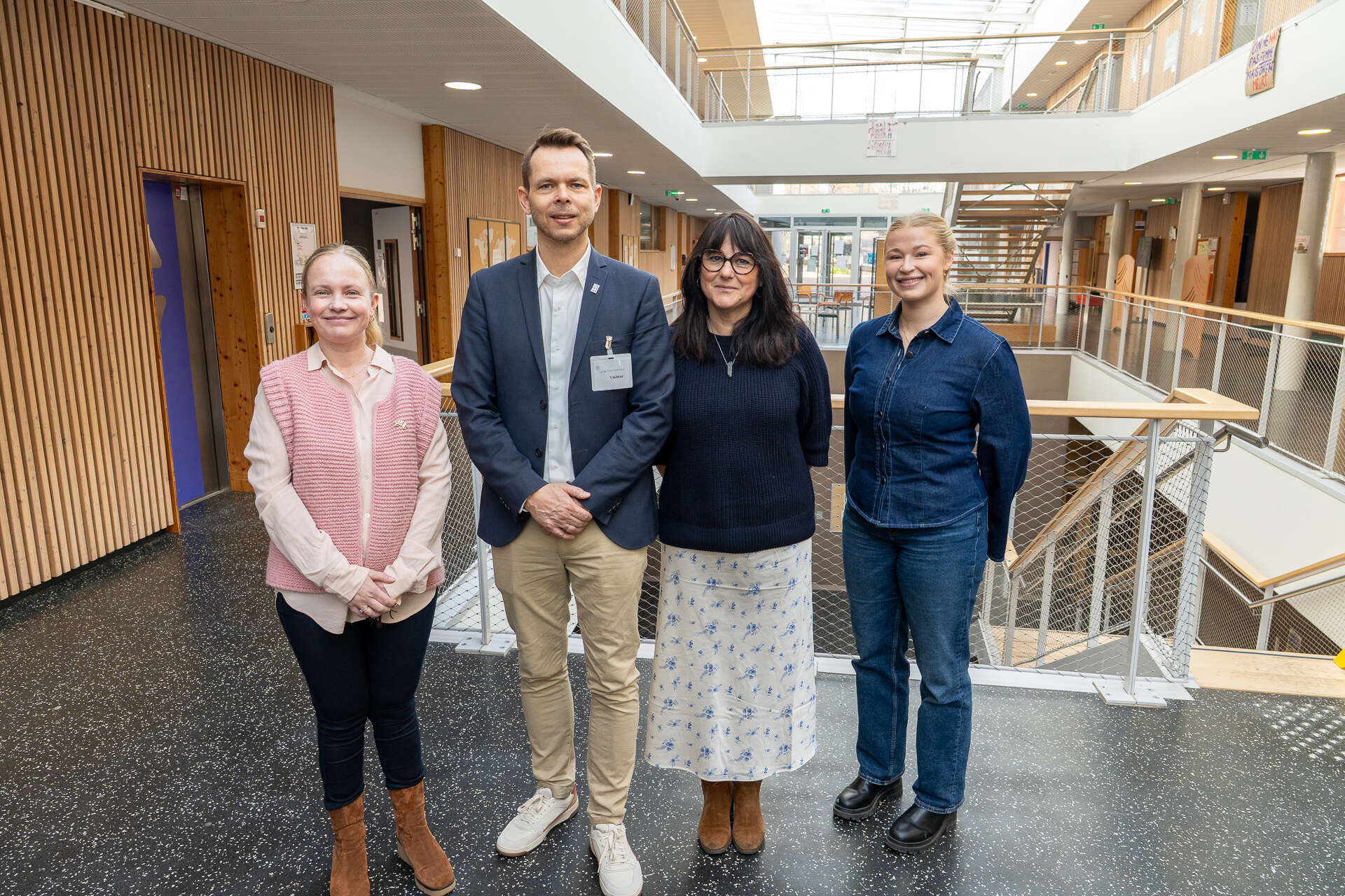 Gruppebilde av fire personer