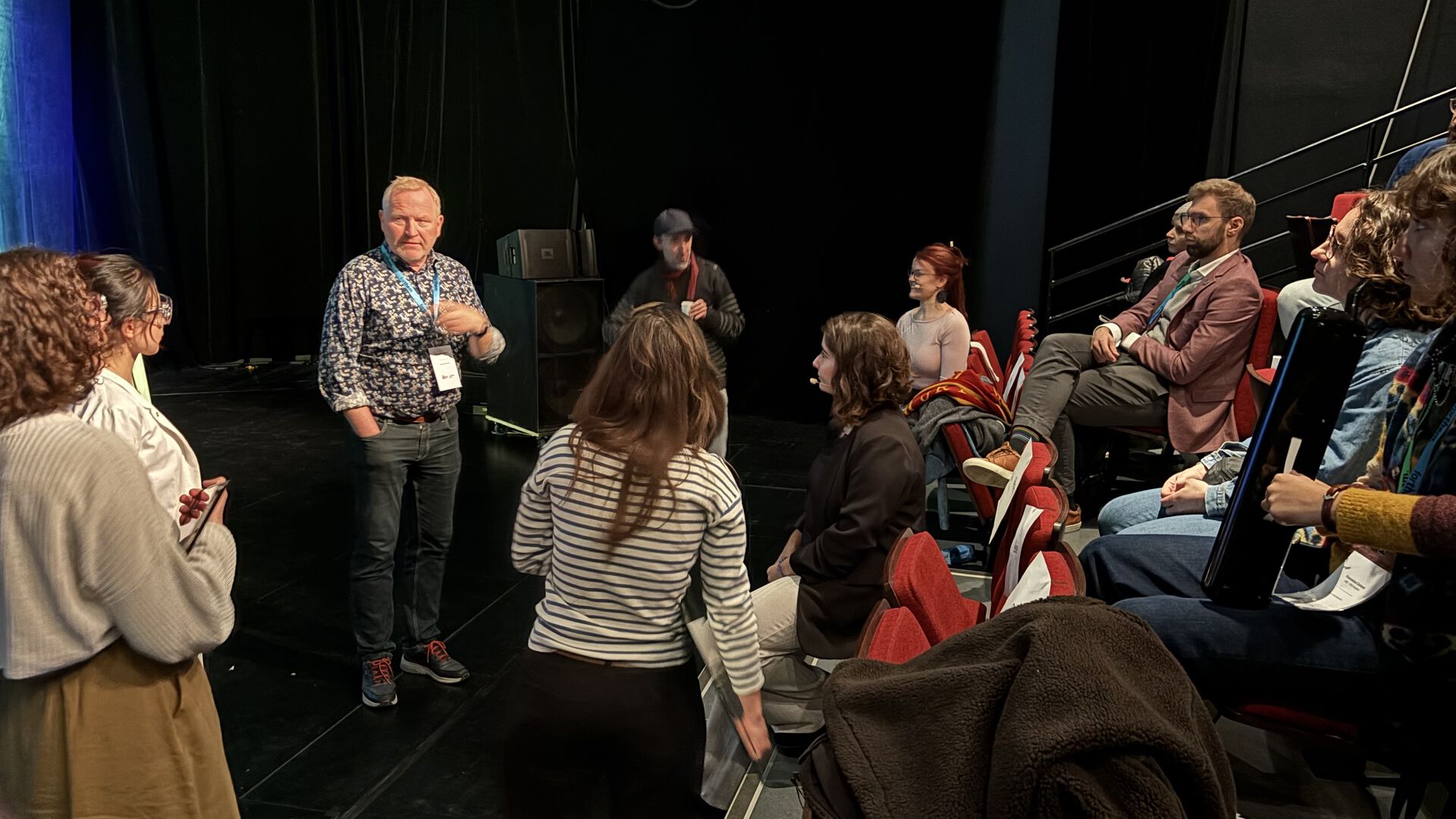 Arne M. Larsen speaking to the participants