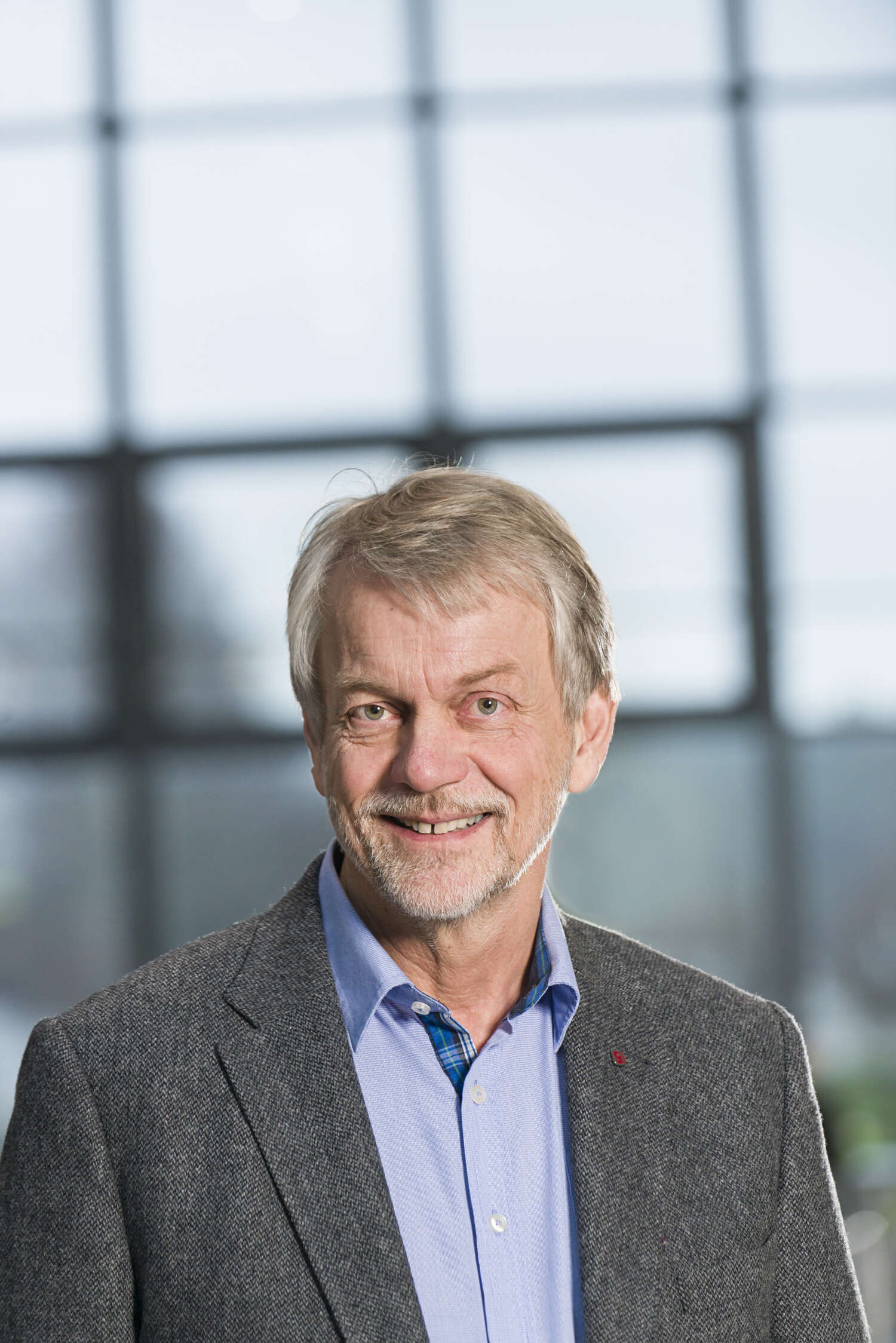 Portrettbilde av professor emeritus, Dag Aasland.