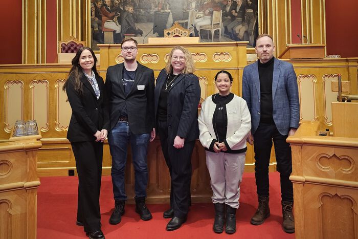 Photo of the UiA group in the Norwegian Parliament 