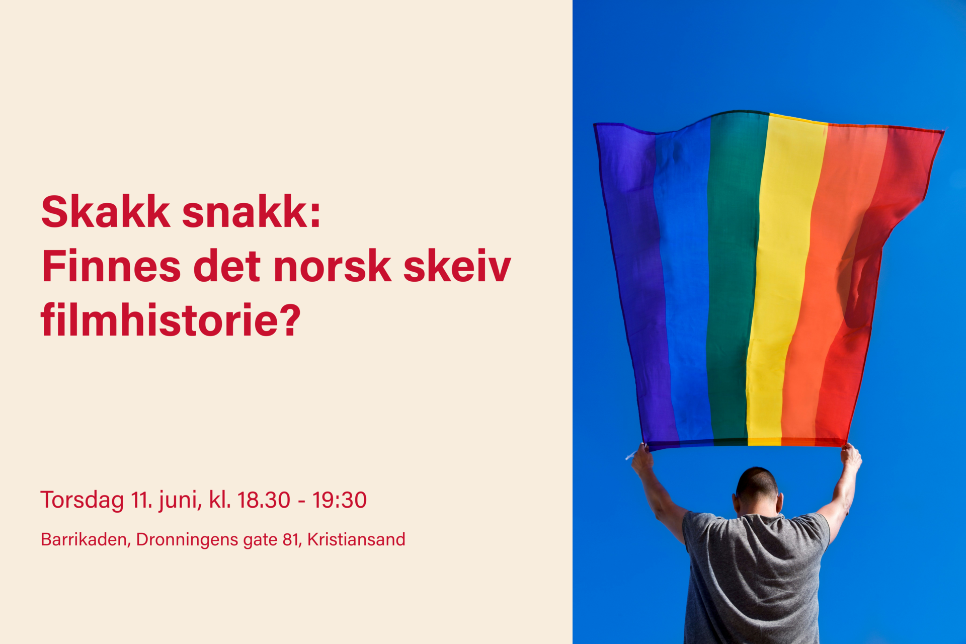 En mann som løper med regnbueflagget